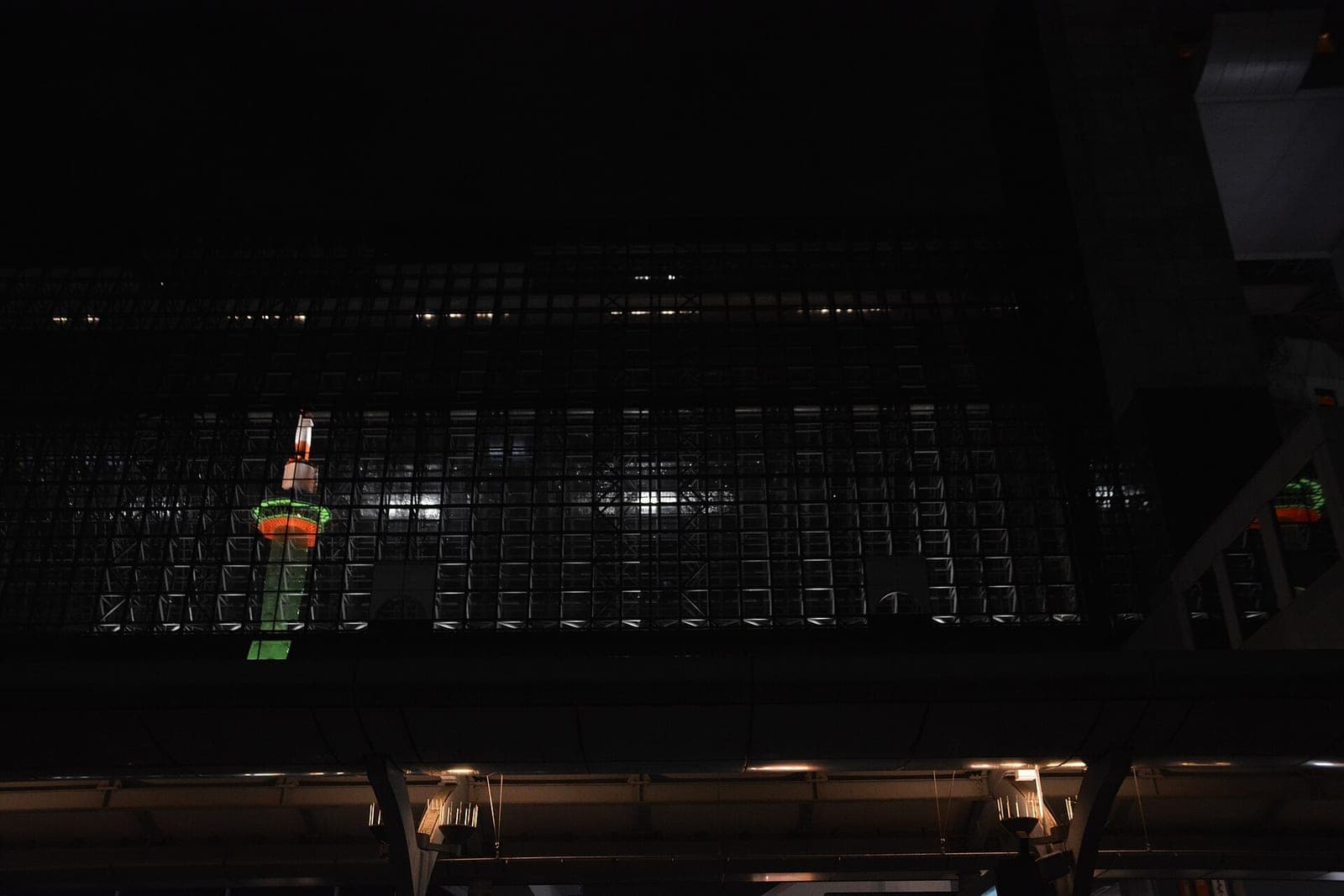 Kyoto Tower reflected in Kyoto Station at night